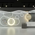 Modern Retail Store with Circular Counter Curved Backdrop Lighting and Product Display Shelves
