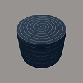 Dark Blue Round Ottoman With Concentric Striped Design And Upholstered Fabric