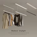 Clothes Hangers In Medieval Style With Droplight Hanging From Ceiling And Clothes