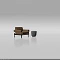 Modern Brown Leisure Chair with Black Armrests Sturdy Legs and Gray Ottoman