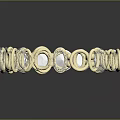 Elegant Gold Bracelet Meticulously Set With Sparkling Transparent Gemstones In Circular Pattern