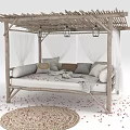Wooden Frame Outdoor Canopy Daybed With White Curtains Plush Pillows Woven Rug And Scattered Petals