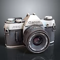 Vintage Canon AE 1 Electronic Camera With Classic Design And Lens