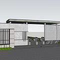 Modern Entrance Gate Featuring Metal Design Overhead Canopy Concrete Walls And Green Lawn