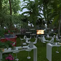 Garden Landscape With Palm Trees Green Plants Outdoor White Tables Chairs And Red Car