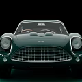 Green Vintage Sports Car With Sleek Body Design And Classic Retro Styling