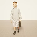 Young Man In Hoodie Shorts Carrying Briefcase In Empty Space