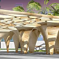 Wooden Pergola With Arched Structure And Lattice Top Surrounded By Palm Trees