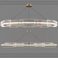 Two Modern Circular Chandeliers With Metal Frame And Glass Elements Mounted On Gray Paneled Wall