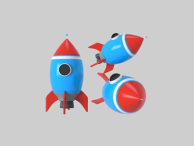 Three Colorful Cartoon Style Rocket Toys With Blue Red And White Stripes 3d model