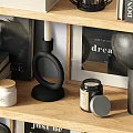 Decorative Ornament Collection With Sculptures Books Frames On Wooden Shelves
