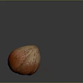 Fresh Ripe Hazelnut With Orange Textured Surface On Dark Background