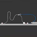 Electronic Components Model With White Platform Blue Wires Connectors And Gray Box
