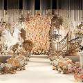 Elegant Banquet Hall With White Pegasus Sculpture Floral Wall And Chandeliers