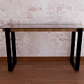 Modern Console Table with Glass Top Wooden Frame and Black Metal Legs in Brick Wall Setting