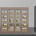 Golden And Black Display Cabinets With Glass Doors And Illuminated Storage Boxes