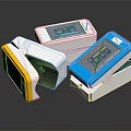 Pulse Oximeters in Yellow White Blue with Digital Display Readings on Black Background