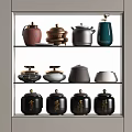 Elegant Modern Tea Sets With Ceramic Teapots And Metal Caddies On Display Shelves