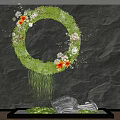 Round Colorful Floral Greenery Wall Decor With Hanging Plants On Dark Background And Silver Decor
