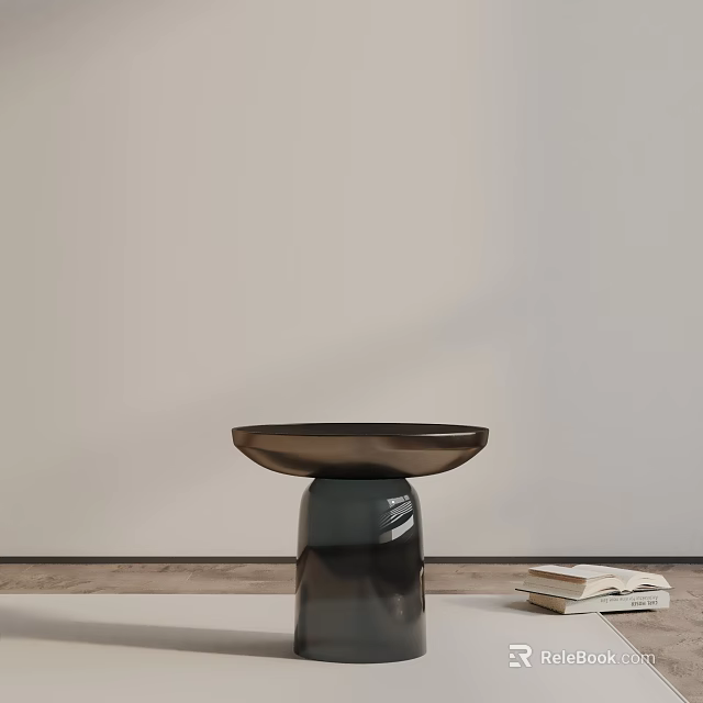 Modern Round Side Table With Unique Black Base And Books Nearby 3d model