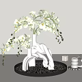 White Orchid Flowers In Silver Vase On Decorative Tray With Small Decor Items
