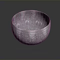 Intricate Carved Silver Bowl Sculpture With Detailed Patterns And Reflective Surface