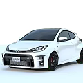 White Toyota Sporty Compact Hatchback With Black Wheels And Front Design
