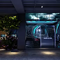 Modern Internet Cafe Interior Design Featuring Tech Inspired Gaming Screens Comfortable Seats And Neon Lighting