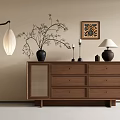 Wooden Entryway Side Cabinet With Drawers Decorative Vases Lamps And Wall Art