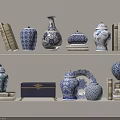 Blue and White Decorative Ornament Set With Vases Jars Box Plate and Books On Shelf