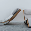 Modern Lounge Chair Design With Wooden Frame Gray Cushion And Curved Structure