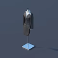 Mannequin Wearing Black Suit And White Shirt Standing On Silver Square Base Against Blue Background