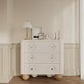 Elegant White Sideboard with Decorative Drawers Table Lamp Photo Frame Candlesticks in Beige Wall