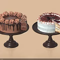 Two Decorated Cakes on Black Stands with Chocolate and Vanilla Frosting Slices