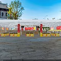 Trustworthy Livelihood Supermarket Department with Red Pillars Beverage Shelves and Yellow Promotion Counters