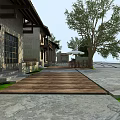 Traditional Guesthouse Building With Wooden Walkway Stone Pavement And Outdoor Seating
