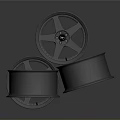Three Silver Alloy Car Wheels Stacked As High Quality Automotive Parts