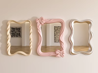 Three Decorative Wall Mirrors With Beige Pink Silver Frames And Bow Design 3d model