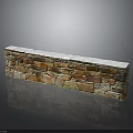 Stone Wall Structure With Snow Covered Top And Varied Colored Stone Bricks
