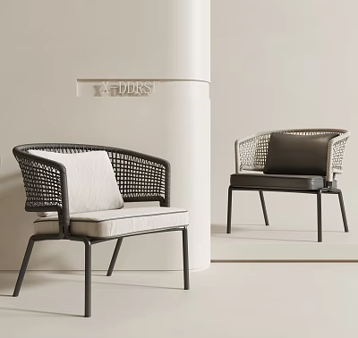 Woven Leisure Chairs With Metal Legs Light And Dark Cushions In Minimalist Indoor Setting 3d model