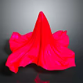 Red Flower Shaped Fabric Plant Against Dark Background With Reflection