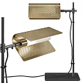 Modern Brass Desk Lamp With Perforated Shade Adjustable Arm And Black Metal Stand