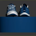 Blue Canvas Lace Up Low Top Shoes Displayed On Blue Cylinder Stand