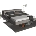 Modern Double Bed Interior With Gray Headboard Pillows Blanket Nightstand Plant Backpack And Books