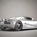 Silver Sports Car With Streamlined Body Sleek Front Headlights And Black Alloy Wheels