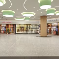 Modern Shopping Mall Lobby Featuring Escalators And Illuminated Side Walls