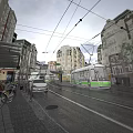 Bustling Commercial Street With Passing Tram Historic Buildings Wet Pavement And Street Lamps