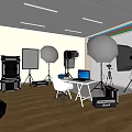 Professional Photography Studio Setup With Lighting Reflectors Tripod Laptop Chair And Case