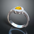 Elegant Silver Ring With Heart Shaped Yellow Gemstone And Small Diamonds