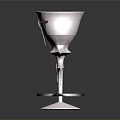 Elegant Silver Goblet With Intricate Star Shaped Details And Spiked Base Stand
